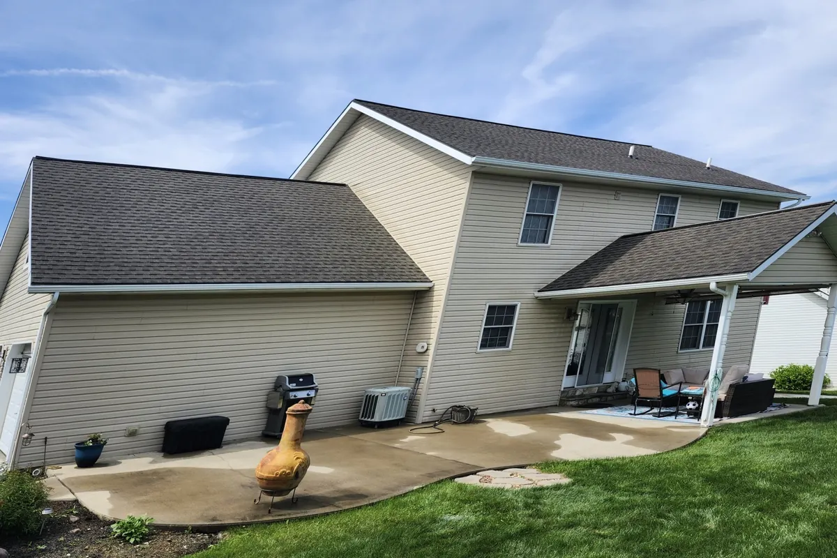 Roof after SoyFuze soy oil treatment, darker even shingles